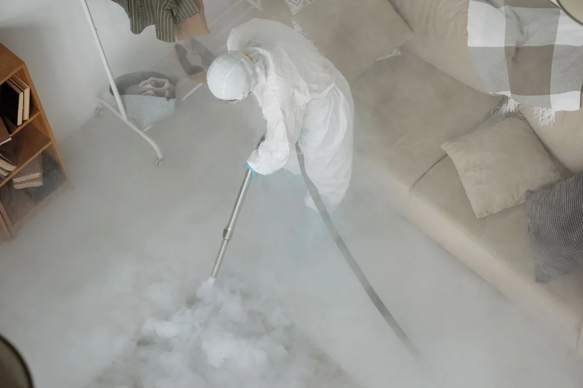 Biohazard cleanup technician in protective equipment, New Port Richey East, FL